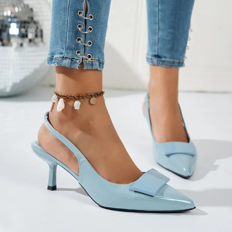 Livona Patent Bow Slingback Pumps