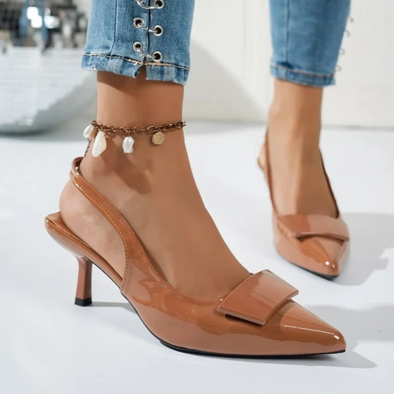 Livona Patent Bow Slingback Pumps